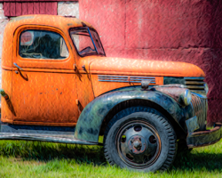 A bold orange orchard truck boasts a shabby chic look.