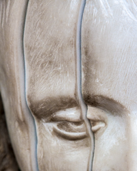 The sculptor's hand magically transforms marble into the illusion of a diaphanous veil.